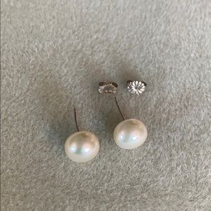 Jumbo pearl earrings with sterling silver studs.